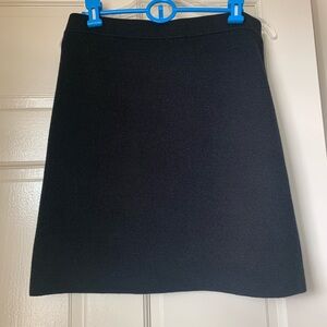 Black knit above the knee skirt.